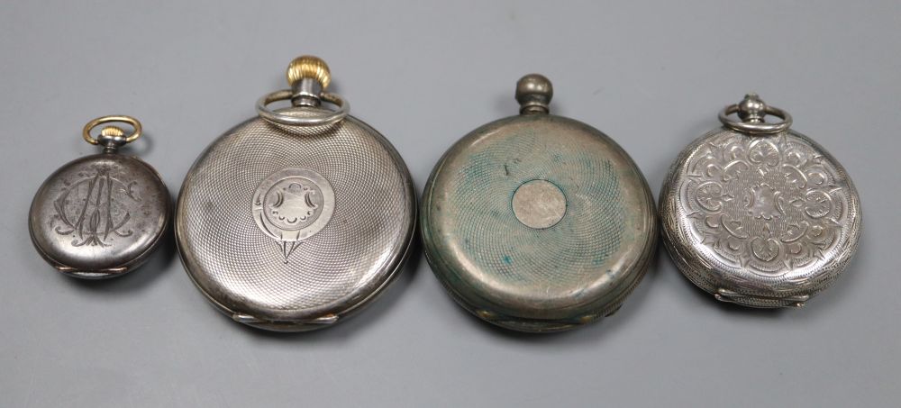 Three assorted white metal pocket watches and a fob watch.